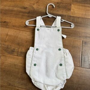 White Baby Romper with Green Buttons